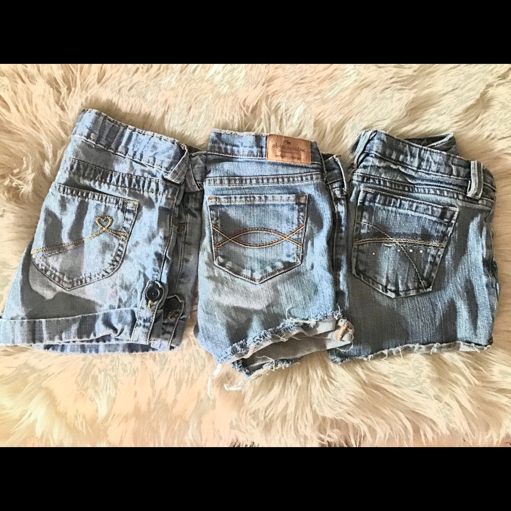 three pairs of denim shorts